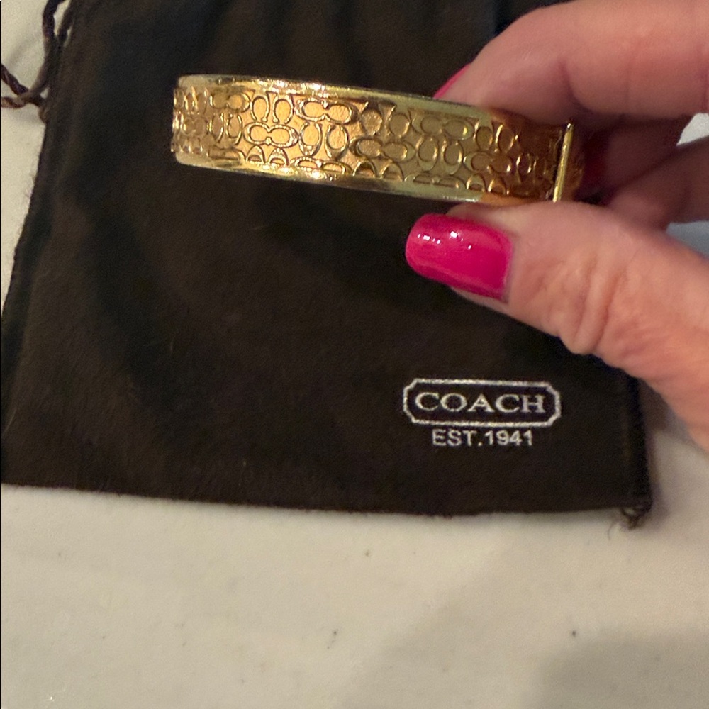 Coach Gold-Tone Signature Pattern Bangle Bracelet - Picture 2 of 5